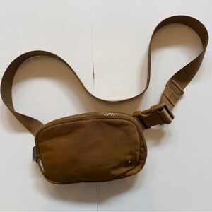 Lululemon golden brown fanny sling bag. Very good condition.